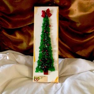 Crushed glass tree under resin.